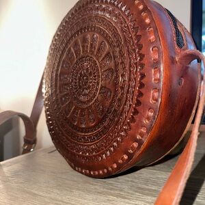 Round Brown Embossed Leather Crossbody Bag